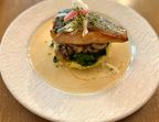 Photo Saumon label rouge, sauce a la bisque de homard, riz pilaf safrané, tombé d’épinard et champignons - CHEZ MICHEL